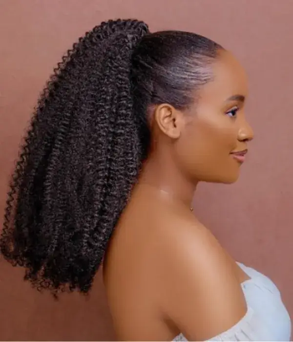 Sleek Part with Curly Ponytail