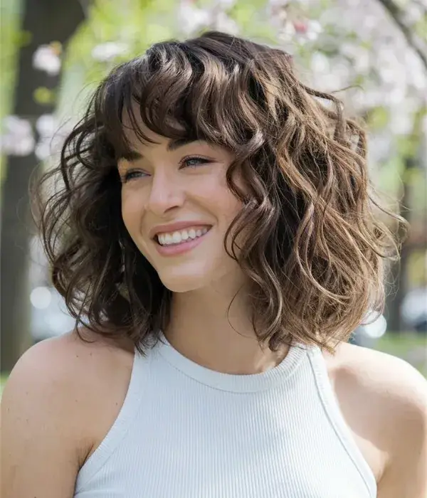Bangs and Curls: A Match Made in Heaven